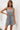 Ivy Lane Buttoned Round Neck Sleeveless Romper - Ethara Jay